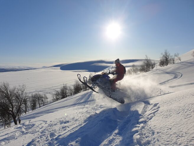 Full Day Guided Snowmobile Powder Tour